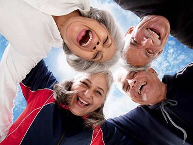 Group of friends smiling with a top-down photo view