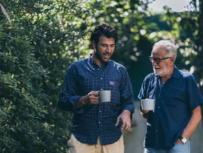 Men talk outside