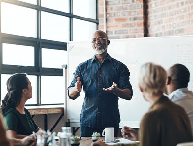 Man giving a presentation for work group