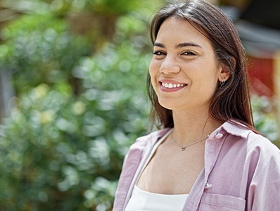 Female adult smiling while outside