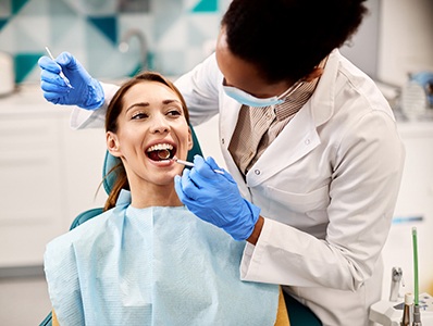 Woman at the dentist’s office undergoing a checkup